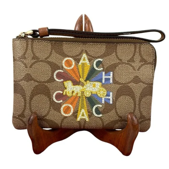Coach EUC Rainbow Radial Print Khaki and Tan Pride Small Corner Zip Wristlet - Picture 1 of 17